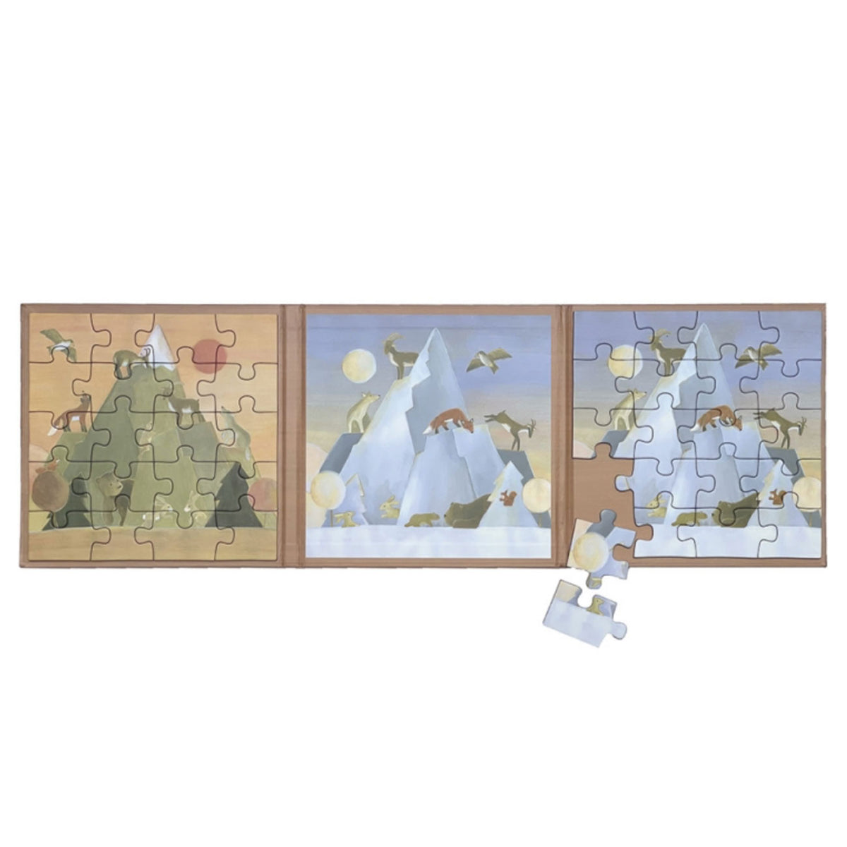 Magnetpuzzle mit einem Berg im Sommer und einem Berg im Winter mit verschiedenen Tieren